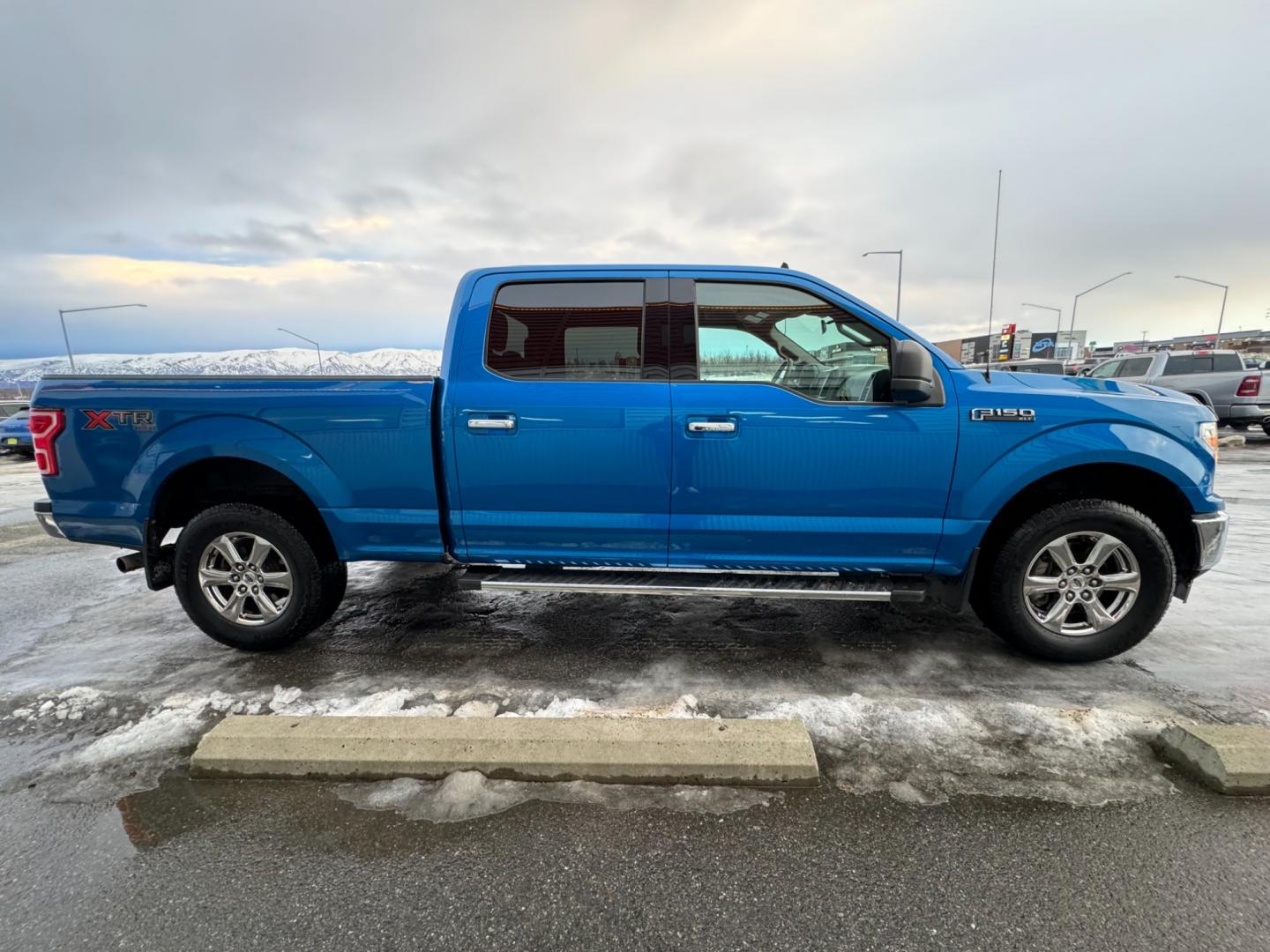 2019 Blue /Gray Ford F-150 XLT (1FTFW1E53KF) with an 5.0 XLT engine, 10-Speed Automatic transmission, located at 1960 Industrial Drive, Wasilla, 99654, (907) 274-2277, 61.573475, -149.400146 - Photo#6